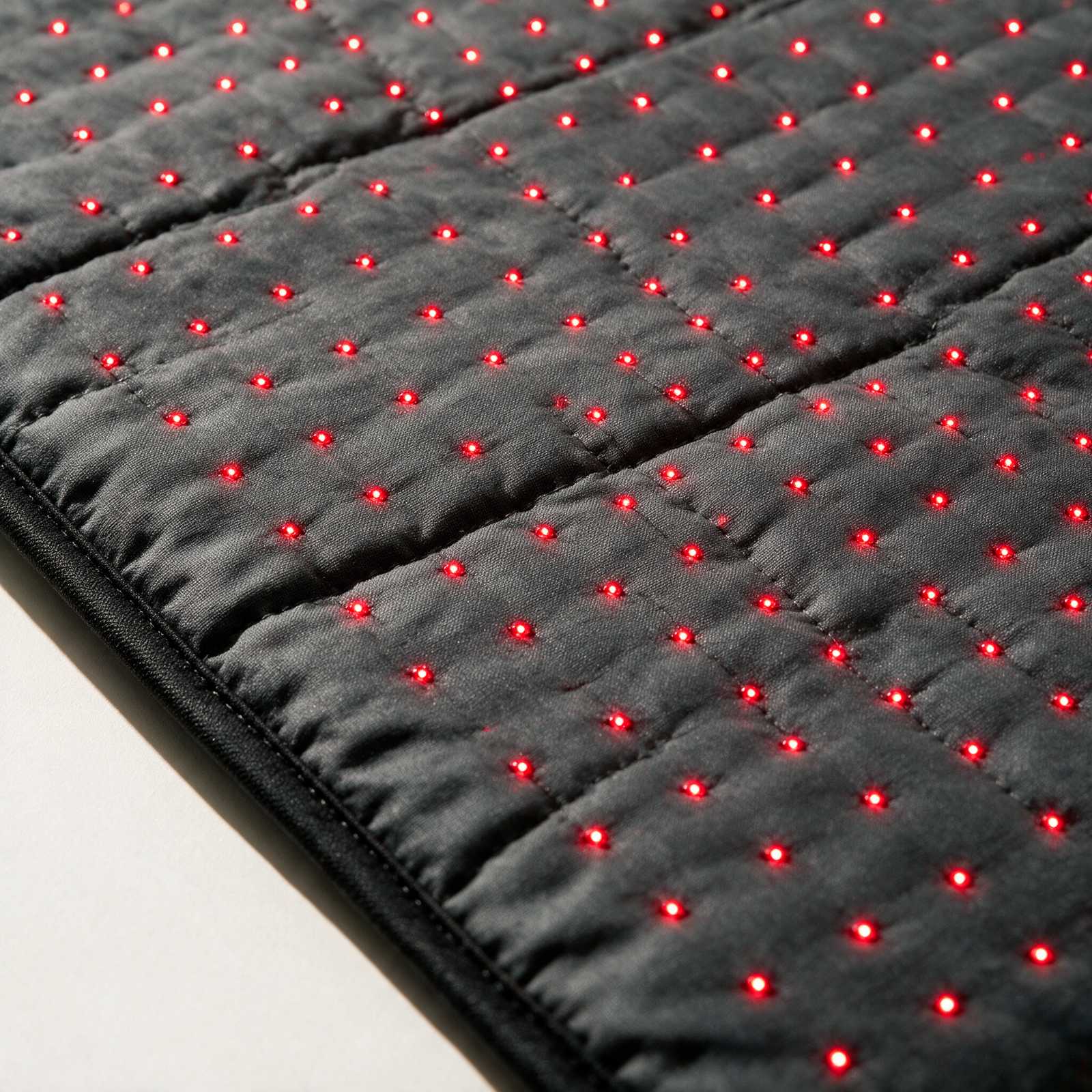 Macro detail of the Mat's quilted LED surface