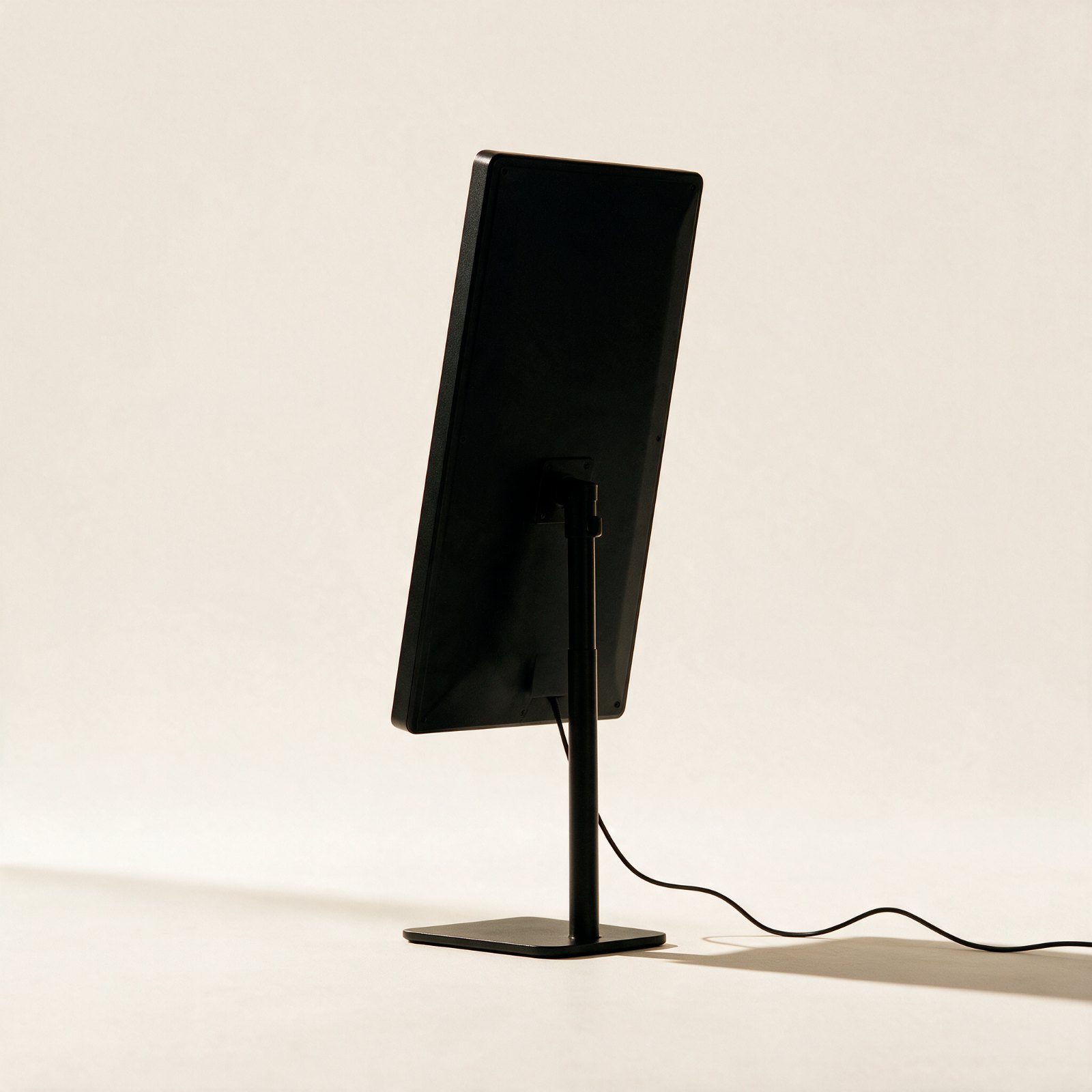 The Panel seen from behind, showing the stand joint and base